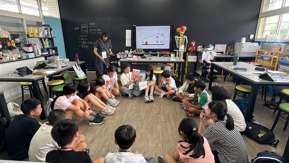 Children gathered around the picture-book reading